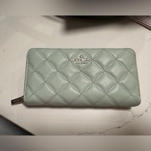 Used like new, Kate Spade mint green zipper wallet.